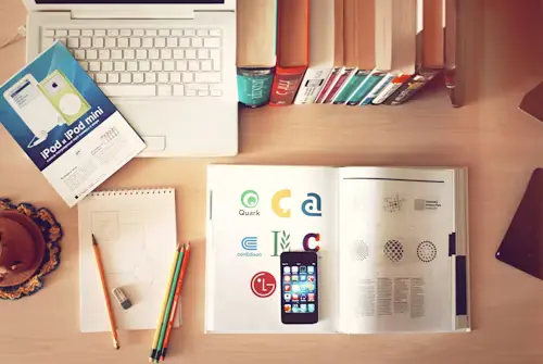 An office desk with many books