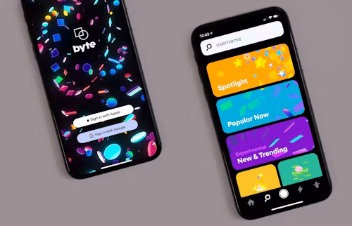 Two cellphones with apps open on their screens